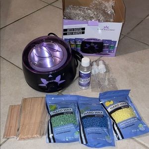 Brand new never used Wax machine supplies included
